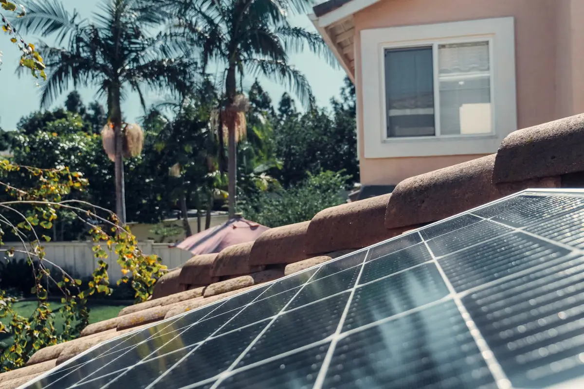 High-performance solar panels on a sunny California home roof representing long-term financial savings and ROI.
